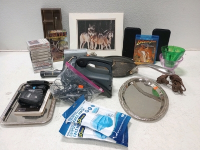 (1) Cyclops 2.5 Millon Candle Power Flashlight, (2) Sliver Party Serving Trays, (1) The ROCK Frying Pan, (1) NEXTEL i560 Flip Phone w/ Charger, Case, Clip-on, (2) Philips Speakers, (1) JVC Speaker, (1) Extension Cord, (1) Wolf Picture, (1) Box of Hunting 