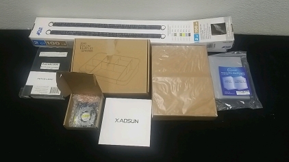 (1) 2ct Extension Springs w/ Safety Cables (1) Bag of Plexy Glass, (1) 240W USB4 Cable (2) Journals, (1) Cosmetic Organizer (1) Laptop Fan