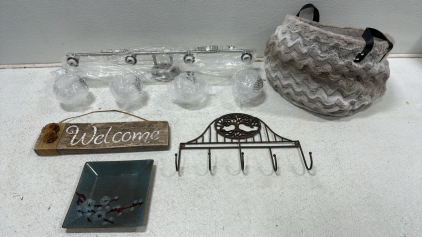 Silver 4-Bulb Vanity Lighting Fixture with (4) Clear Glass Orb Shades, Iron Coat/Hat Rack with Tree Design, Pier 1 Square Ceramic Plate, Wooden Welcome Sign, Fur Lined Laundry Basket