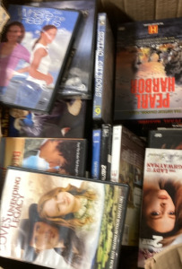 BOX FULL OF DVDS.