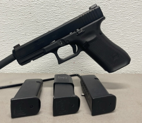 Glock Model 17 Gen 5 9mm Caliber Revolver In Original Box, Two Extra Magazines, Speedloader, And Extra Grips