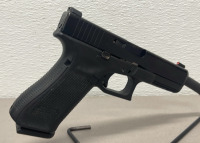 Glock Model 17 Gen 5 9mm Caliber Revolver In Original Box, Two Extra Magazines, Speedloader, And Extra Grips - 2