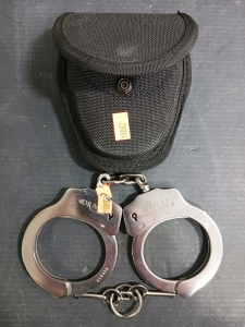 (2) Protection Items - (1) Drago Chain Handcuffs w/ Key (1) Nylon Pouch