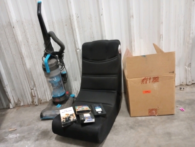 (1) Bissell Vacuum Cleaner a Box of VHS Tapes and a Foldable Gaming Chair (r3)