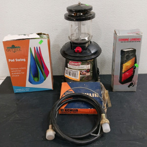 (5) Outdoor & Utility Items - (1) Outree Pod Swing (1) Coleman Lantern (1) Combine Lumieres Light (1) Echlin Carburetor Parts (1) Propane Hose