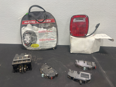 (1) Tire Chains (1) Tail Light (3) Pole Curcuit Breakers (1) Circuit Breaker and more