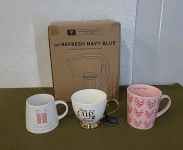 (1) Alkaline Water Filter Pitcher, (3) Ceramic Coffee Mugs & (1) Box Of Assorted Christmas Decor & Amazon Overstock/ Returns