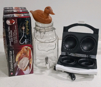 (1) "Kitchen Essentials w/ Rustic Charm - (1) Natural Wood Duck (1) Electric Pie Maker - Powers On (1) Yorkshire Glass Beverage Dispenser w/ Lid and Spigot (3) Turbo Roaster Kits"