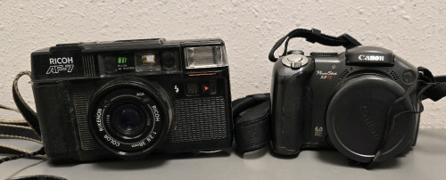 Canon PowerPoint & Ricoh AF-7 Cameras