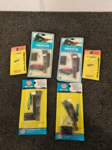 (4) N-Scale Switches and (2) Atlas Gauges for Model Railroading