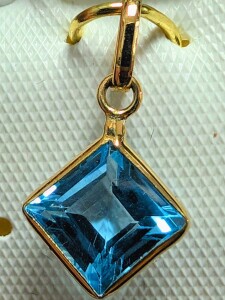 $400 10K Blue Topaz 1.4Ct Pendant