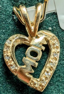 $1400 10K 1.32G Diamond 0.1Ct Pendant