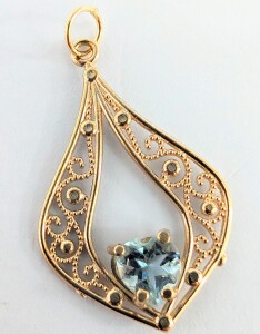 $800 10K 0.95Gblue Topaz 0.9Ct Pendant