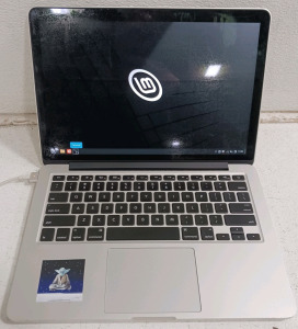 (1) MacBook Pro w/ Power Cable - Linux Mint Cinnamon 21.2
