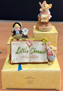 An Assortment of Little Cheeses Figurines Including; (1) &ldquo;Display Sign&rdquo; Item#LCPOP7 (1) &ldquo;Character Member Figurine&rdquo; Item#05631 & More