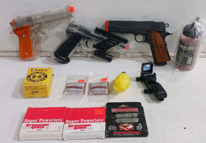 (3) BB Pistols w/ Accessories - (9) CO2 Cartridges (1) Ammo Box (1) Red Dot Sight
