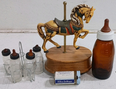 (1) Carousel Music Box Figurine - Plays "Carousel Waltz" (5) Vintage Glass Bottles w/ Nipples (1) Amber Baby Bottle (1) Alka-Seltzer Jar