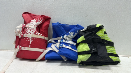 (2) Stearns Universal Adult Life Vests, (1) Stearns Youth Green Life Vest