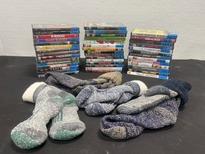 (43) DVDs (4) Pairs Of Winter Socks