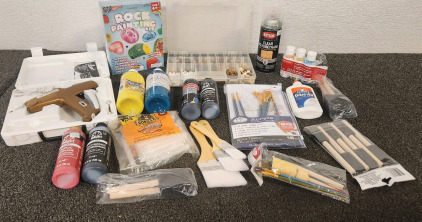 Rock Painting Kit ... Paints Brushes.... Glue Gun... Glue Sticks .. Bead Kit And More...