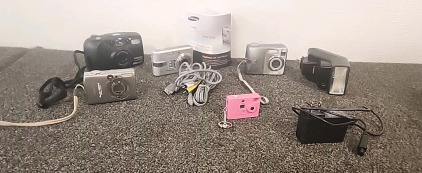 Various Camara's. Canon.... Kodak... Samsung... Pentax.. and a Canon Flash.. Mini Pink Camara..