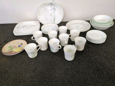 Matching Tea Cups, Plates, and Bowls.