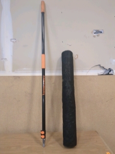 Extend-A-Reach Pole and Roll of Weed Barrier
