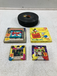 (4) Vintage 8mm Tapes & A Stack Of 45 Records