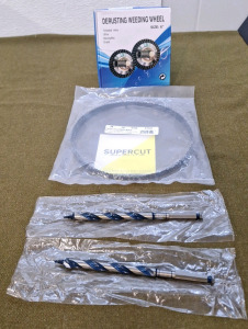 (2) Bosch 1/2" x 7-1/2" Auger Bits, (1) Supercut Carbon Tool Steel Bandsaw Blade, 80"L, 3/8"W 0.025" Thick, 4 Hook & (1) 6" Derusting/Weeding Wheel