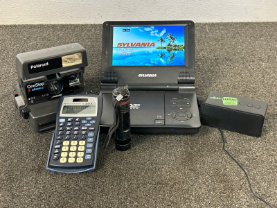 Sylvania Portable DVD Player, Vintage Polaroid Camera, Mini Soeaker, Calculator and Flashlight