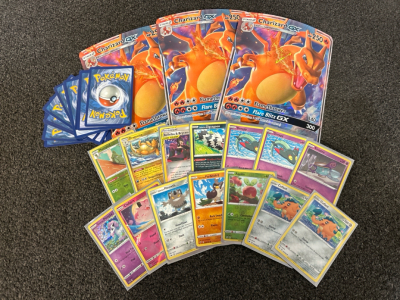 Collectible Pok&eacute;mon Cards and (3) Large Charizard Cards