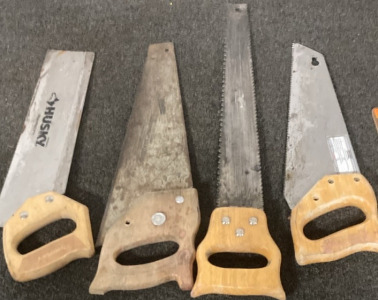 VARIETY OF VINTAGE HAND SAWS.