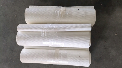 (3) Rolls of White Flexible Plastic