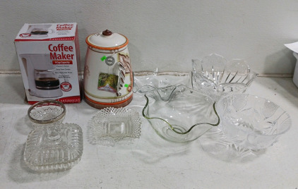 (9) Kitchen Essentials - (1) Coffee Maker (1) Ceramic Canister (7) Glassware Pieces