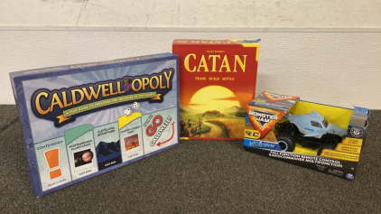 Caldwell-opoly(New), Catan(Used), Monster Jam R/C Megalodon(New)