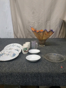 Assorted plates and cups also a large vase