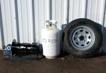(3) Assorted Items - (1) Easy Reel Hose Reel (1) Propane Tank (1) Trailer Tire w/ Wheel<br/>