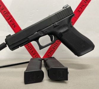 Glock Model 17 Gen 5 9mm Caliber, Semi Automatic Pistol W/ Original Hardcase, Extra Magazine, Speedloader, And Extra Grips