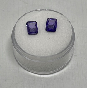(2) 2.90ct. Total Emerald Cut And Faceted Amethyst Gemstones