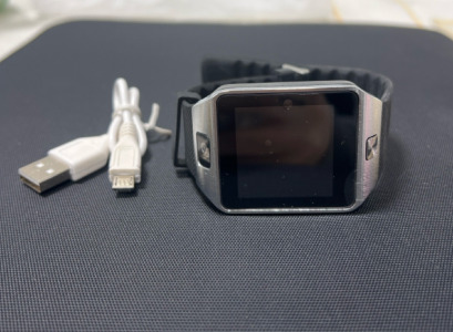 (1) Silver Digital Smart Watch- Unbranded- Comes With Charger