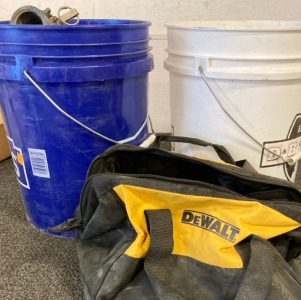 Bucket Filled With Hose Adaptors, Bucket With Metal Decor, & Dewalt Tool Bag