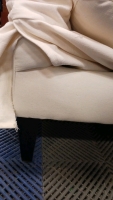 (1) White Upholstered Loveseat W/ White Cover - Duck Down & Duck Feather Cushions - Approx. 60"x35"x34"H - 3
