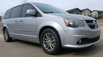 2014 DODGE GRAND CARAVAN - Starts, Drives, and Shifts correctly, 3.6 6 cylinder, black leather interior with chrome trim, heated steering wheel, heated seats, rear climate control, tinted windows, heater blows hot