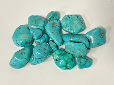(15) Tumbled and Polished Turquoise Stones (253 Cts)
