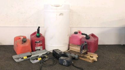 Barrel, Gas Cans, Screwdrivers, Drill, Saw, and Wood Mitre