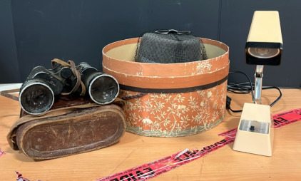 (1) Vintage Zephyr Women&rsquo;s Pillbox Hat With Original Box (1) Vintage Hong Kong Desk Light (1) Vintage 7x50 Nippon Kogaku Binoculars