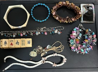(5) Assorted Bracelets (2) Assorted Necklaces (1) Black Slab Pendant