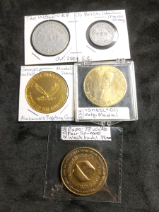 Boise Idaho Trade Tokens The Waldorf, George Wallace Token, Golden Shell Motor Oil Vintage Token and 1978 Spokane Works Fair Token