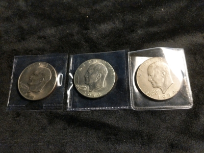 3) Eisenhower Dollars 1977, and (2) 1974