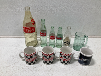 (1) Large 1.5 Liter Coke Bottle, (4) Vintage Coke Bottles, (5) Coke Mugs